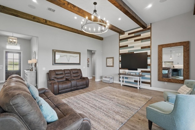 7747 Barber Ranch Rd, Fort Worth, TX 76126 - living area with a chandelier, baseboards, wood finished floors, an accent wall, and beam ceiling
