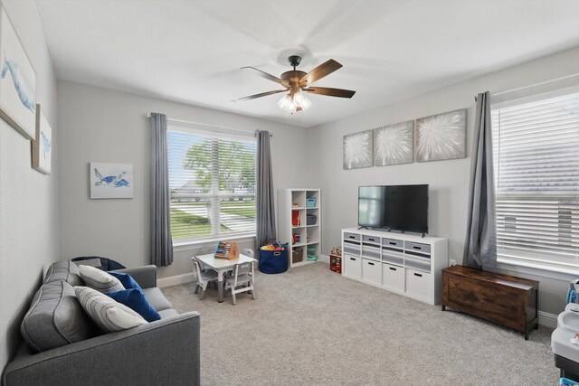7747 Barber Ranch Rd, Fort Worth, TX 76126 - living area featuring carpet, ceiling fan, and baseboards