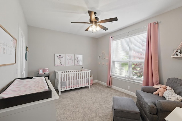 7747 Barber Ranch Rd, Fort Worth, TX 76126 - carpeted bedroom featuring baseboards, a ceiling fan, and a nursery area