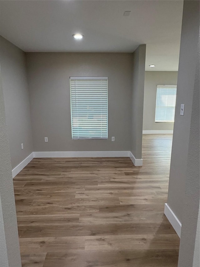 3214 51st St, Dallas, TX 75216 - unfurnished room with wood finished floors, recessed lighting, and baseboards