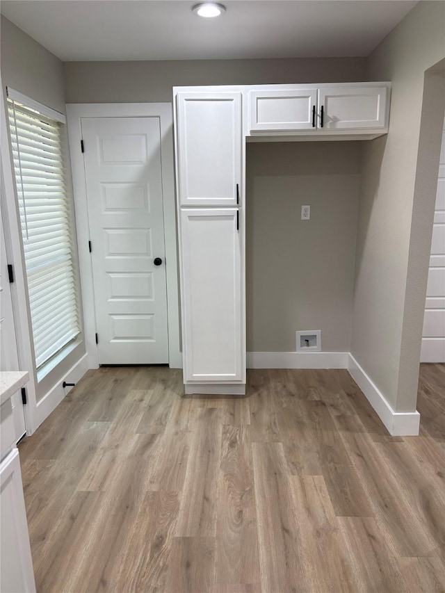 3214 51st St, Dallas, TX 75216 - washroom featuring baseboards, cabinet space, light wood-style flooring, hookup for a washing machine, and recessed lighting