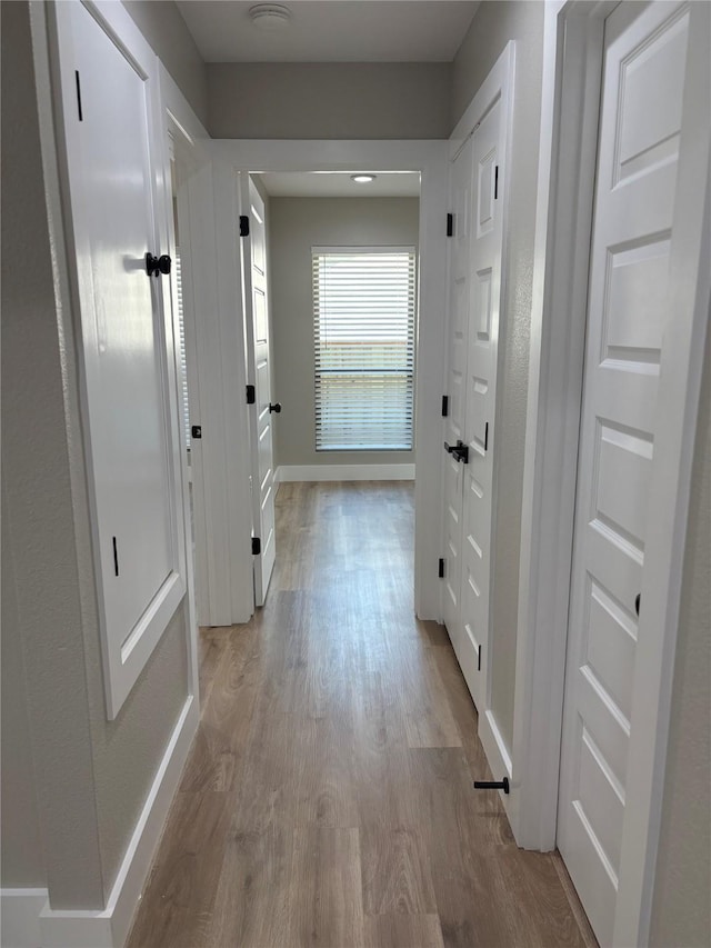 3214 51st St, Dallas, TX 75216 - hall featuring wood finished floors and baseboards