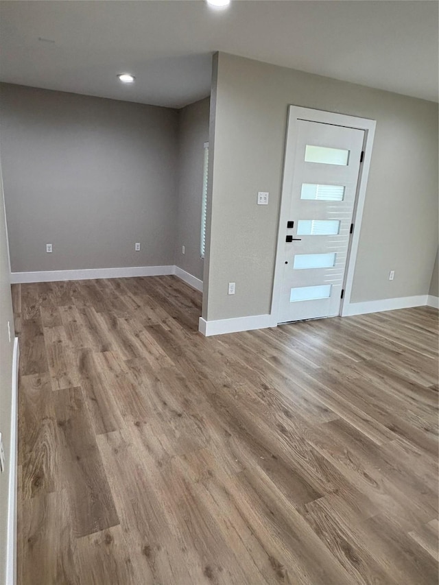 3214 51st St, Dallas, TX 75216 - entrance foyer with wood finished floors, baseboards, and recessed lighting