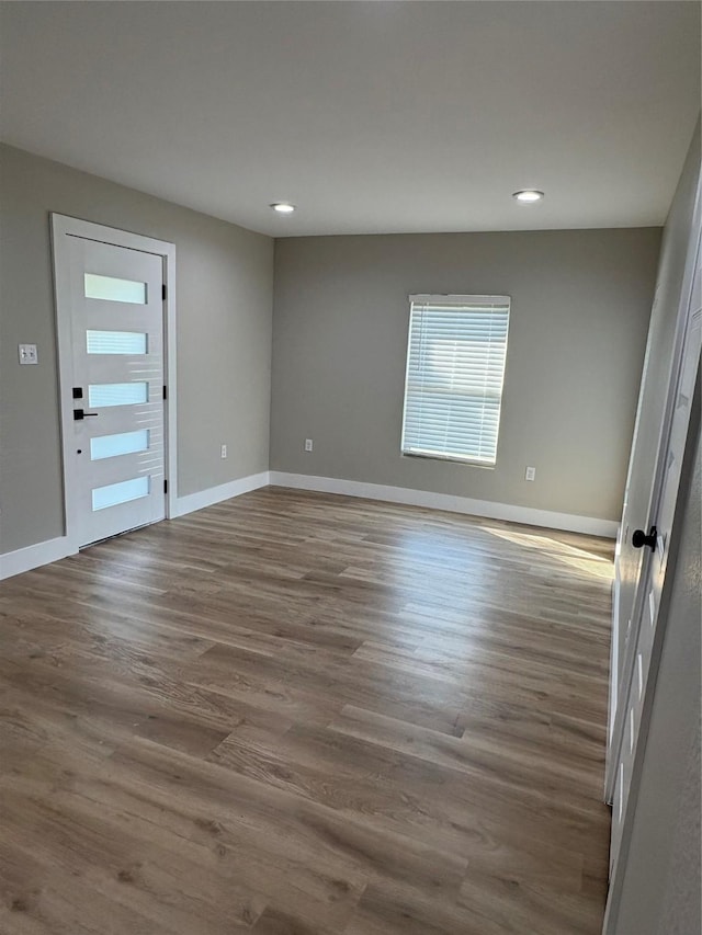 3214 51st St, Dallas, TX 75216 - spare room with recessed lighting, dark wood finished floors, and baseboards