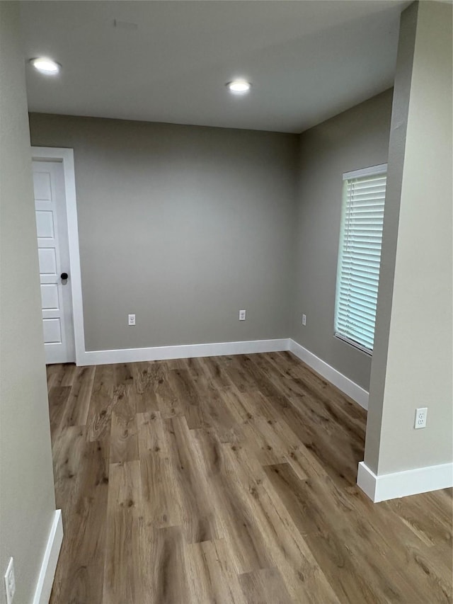 3214 51st St, Dallas, TX 75216 - spare room featuring wood finished floors, baseboards, and recessed lighting