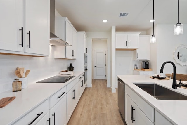 1723 Zachary Ave, Wylie, TX 75098 - kitchen with a sink, stainless steel appliances, white cabinetry, decorative backsplash, and recessed lighting