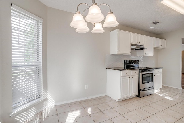 10832 Cobblestone Dr, Benbrook, TX 76126 - kitchen featuring stainless steel range with electric stovetop, under cabinet range hood, tasteful backsplash, a chandelier, and white cabinetry