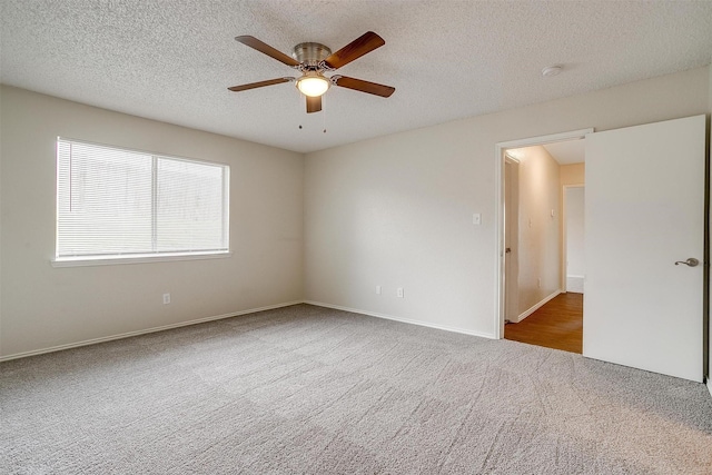 10832 Cobblestone Dr, Benbrook, TX 76126 - carpeted spare room featuring ceiling fan, a smoke detector, a textured ceiling, and baseboards