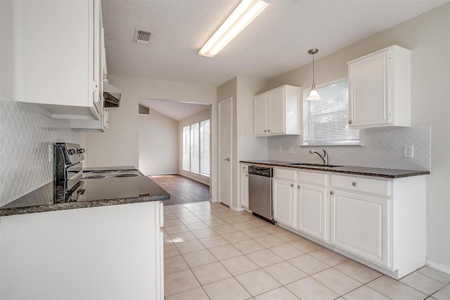 10832 Cobblestone Dr, Benbrook, TX 76126 - kitchen with electric range, dishwasher, a sink, decorative backsplash, and white cabinets