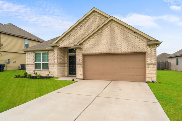 1412 Inks Dr, Desoto, TX 75115 - view of front of property with an attached garage, driveway, brick siding, stone siding, and a shingled roof