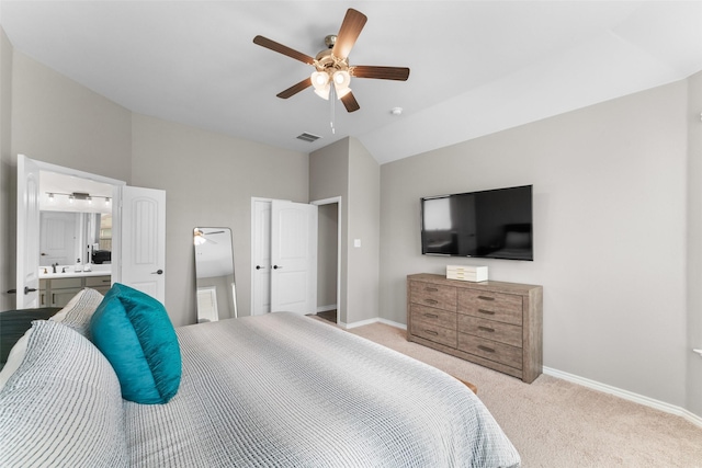 1412 Inks Dr, Desoto, TX 75115 - bedroom with light colored carpet, baseboards, a sink, ceiling fan, and vaulted ceiling