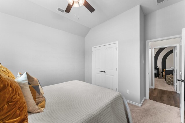 1412 Inks Dr, Desoto, TX 75115 - carpeted bedroom with vaulted ceiling, baseboards, and a ceiling fan