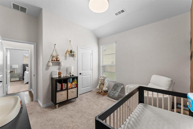 1412 Inks Dr, Desoto, TX 75115 - carpeted bedroom with lofted ceiling, baseboards, and a crib