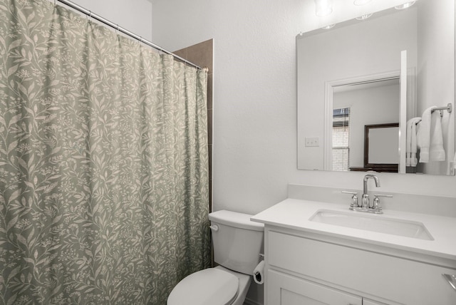 5415 Waterloo Dr, Sachse, TX 75048 - bathroom featuring toilet, vanity, and a shower with shower curtain