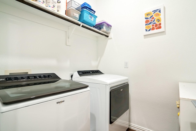 5415 Waterloo Dr, Sachse, TX 75048 - laundry room featuring separate washer and dryer and baseboards
