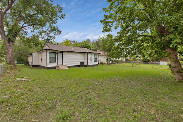 3022 50th St, Dallas, TX 75216 - view of yard with entry steps and central AC unit