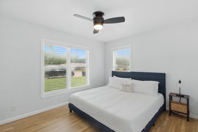 613 Crestview Dr, Granbury, TX 76048 - bedroom with baseboards, light wood-style floors, and a ceiling fan