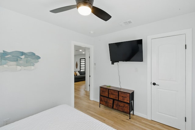 613 Crestview Dr, Granbury, TX 76048 - bedroom featuring light wood-type flooring, ceiling fan, and baseboards