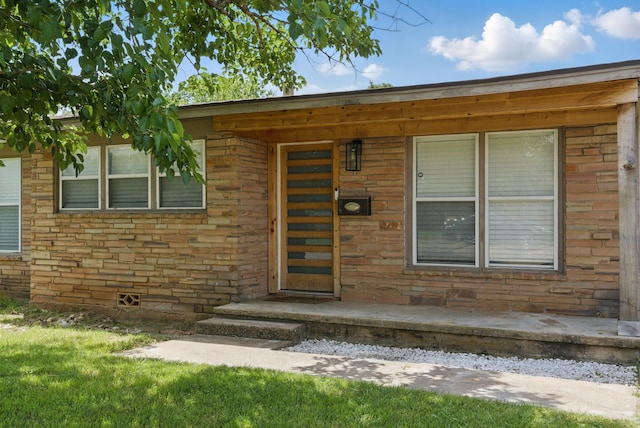 613 Crestview Dr, Granbury, TX 76048 - doorway to property with brick siding