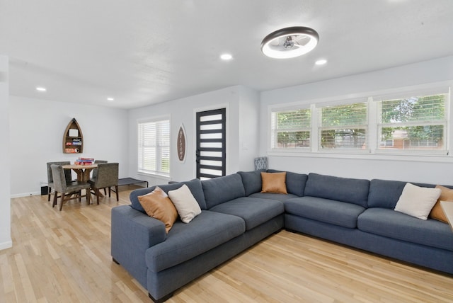 613 Crestview Dr, Granbury, TX 76048 - living area with plenty of natural light, light wood finished floors, recessed lighting, and baseboards