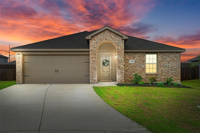 1416 Old Trail Rd, Royse City, TX 75189 - view of front of property featuring brick siding, concrete driveway, an attached garage, and roof with shingles