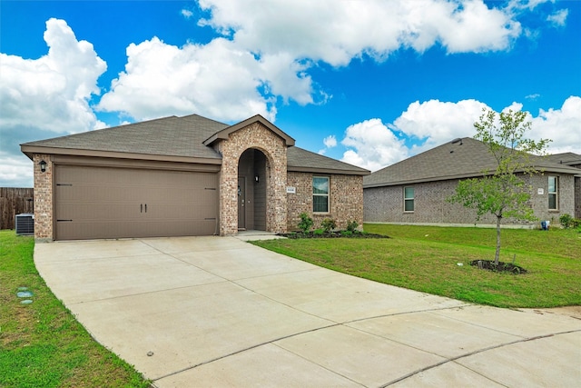 1416 Old Trail Rd, Royse City, TX 75189 - ranch-style home featuring brick siding, a garage, concrete driveway, a front lawn, and cooling unit
