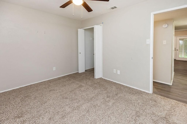 745 Cambridge Dr, Plano, TX 75023 - unfurnished bedroom featuring carpet, baseboards, and a ceiling fan