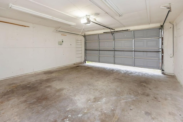 745 Cambridge Dr, Plano, TX 75023 - garage featuring a garage door opener