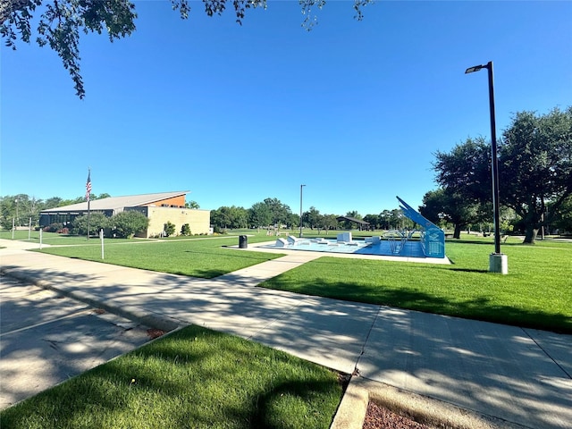 301 Beckham St E, Sulphur Springs, TX 75482 - view of property's community with a lawn