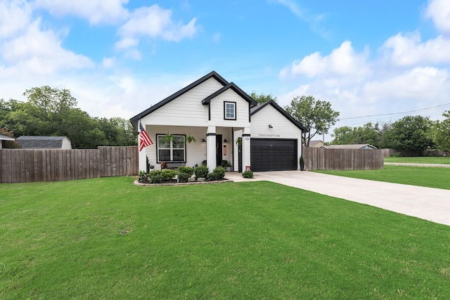 391 E Lamar St, Royse City, TX 75189 - view of front of property featuring concrete driveway, an attached garage, and covered porch