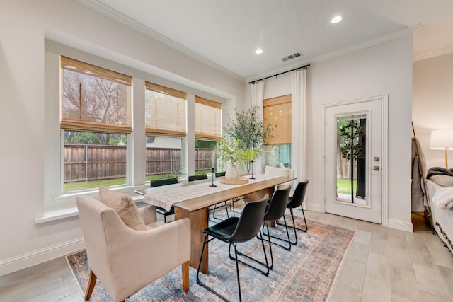 391 E Lamar St, Royse City, TX 75189 - dining space featuring crown molding, baseboards, recessed lighting, and light wood-style floors