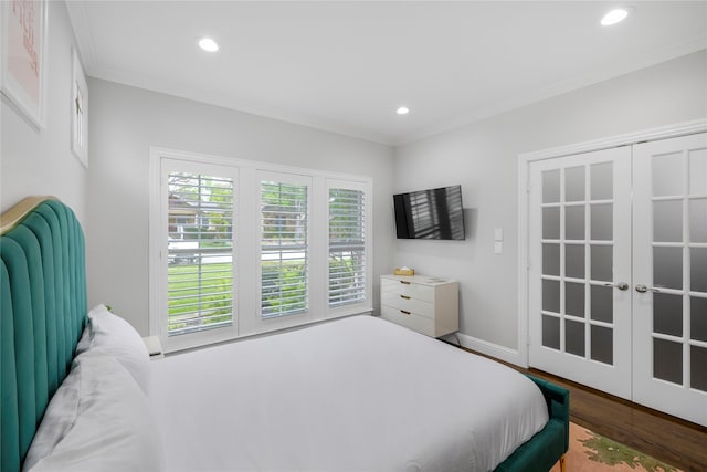 bedroom with wood finished floors, recessed lighting, ornamental molding, french doors, and baseboards