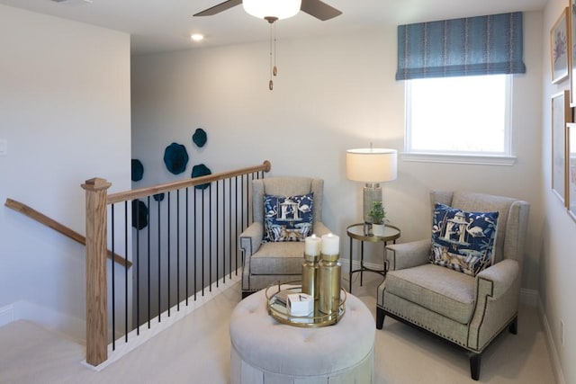 410 Holly Rd, Oak Point, TX 75068 - sitting room with an upstairs landing, baseboards, and ceiling fan