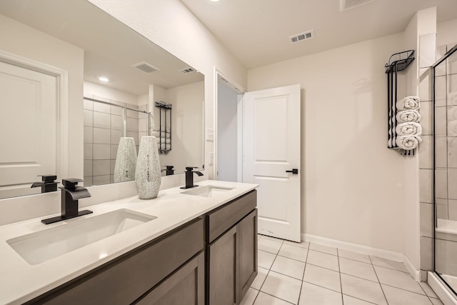 706 Spur Rdg, Princeton, TX 75407 - full bathroom with a stall shower, tile patterned floors, double vanity, baseboards, and recessed lighting