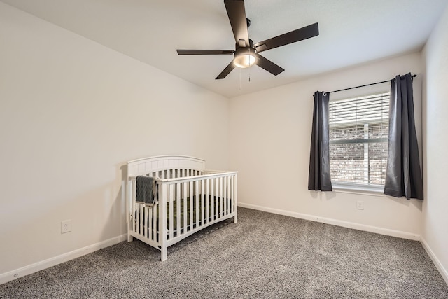 706 Spur Rdg, Princeton, TX 75407 - carpeted bedroom with baseboards, a crib, and ceiling fan