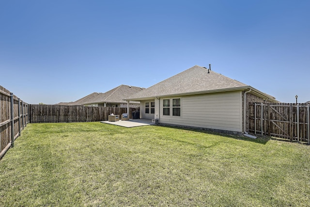 706 Spur Rdg, Princeton, TX 75407 - rear view of property with a patio area and roof with shingles