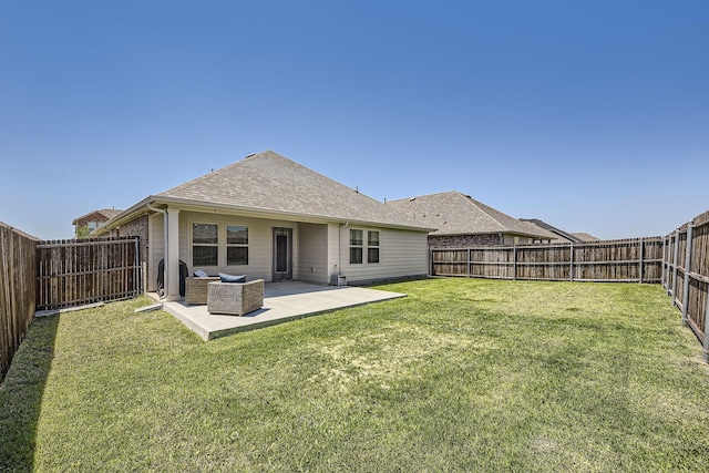 706 Spur Rdg, Princeton, TX 75407 - rear view of house with a fenced backyard, a shingled roof, and a patio area