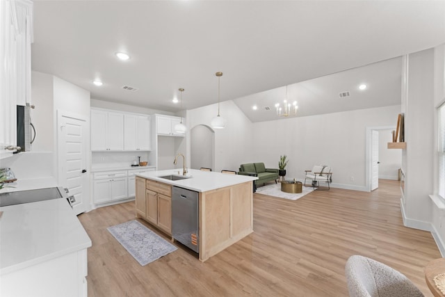 2104 Danner St, Fort Worth, TX 76105 - kitchen featuring appliances with stainless steel finishes, a sink, open floor plan, light wood-style flooring, and a kitchen island with sink