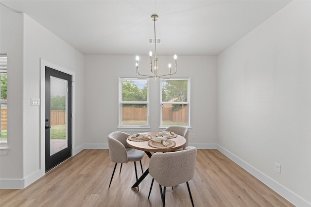 2104 Danner St, Fort Worth, TX 76105 - dining room featuring light wood-type flooring and healthy amount of natural light