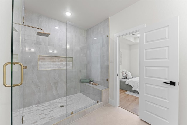 2104 Danner St, Fort Worth, TX 76105 - bathroom with a shower stall, ensuite bathroom, and tile patterned flooring