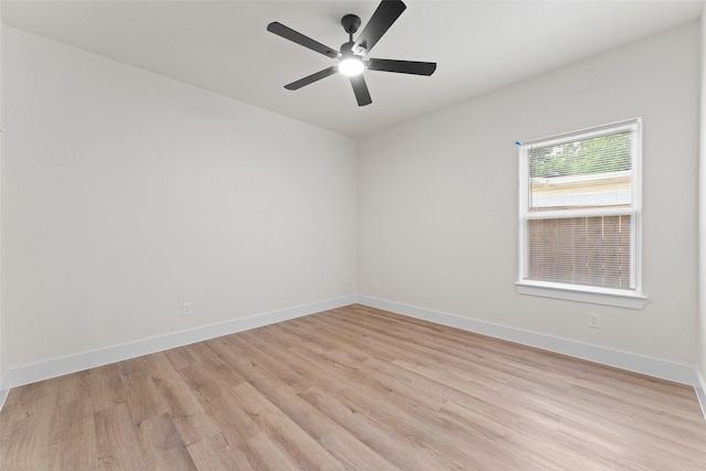 2104 Danner St, Fort Worth, TX 76105 - unfurnished room featuring light wood-type flooring, a ceiling fan, and baseboards
