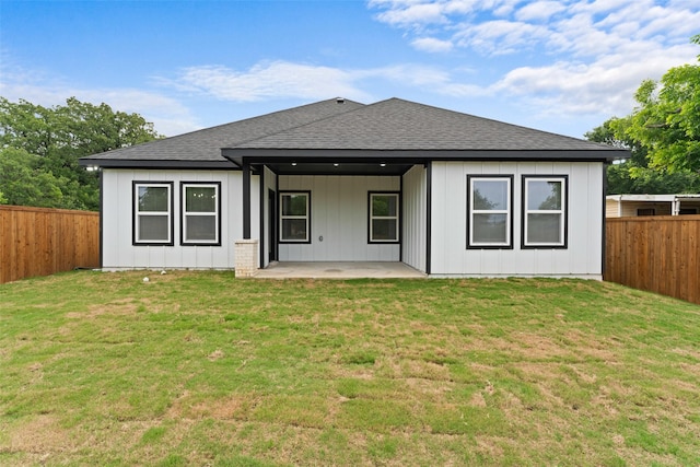 2104 Danner St, Fort Worth, TX 76105 - rear view of property featuring a shingled roof and a patio area