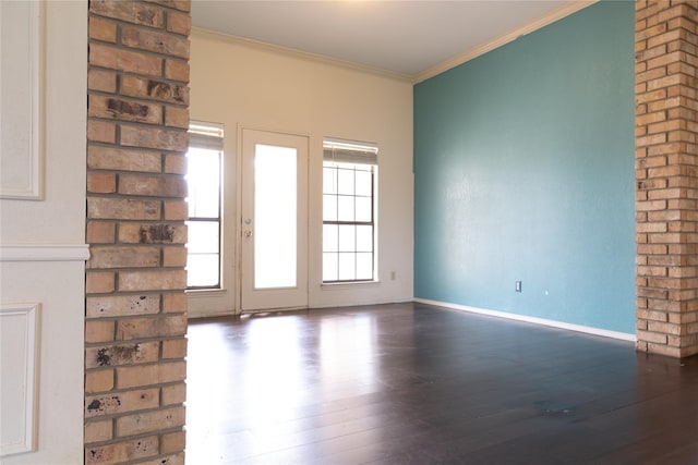 2305 Meadowlark Ln, Bedford, TX 76021 - unfurnished room with wood-type flooring, ornamental molding, and baseboards