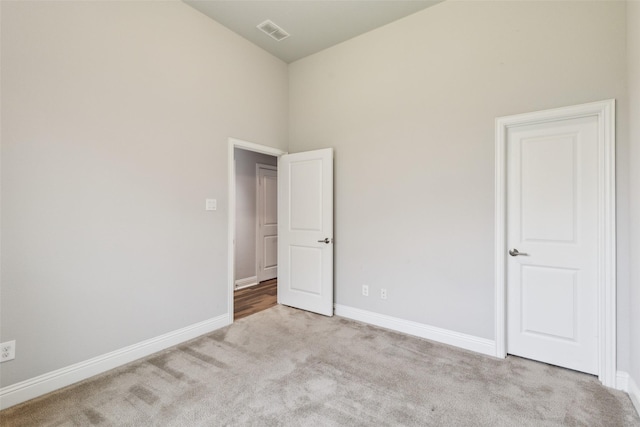 9521 Excursion Dr, Oak Point, TX 75068 - unfurnished bedroom with carpet flooring, baseboards, and high vaulted ceiling
