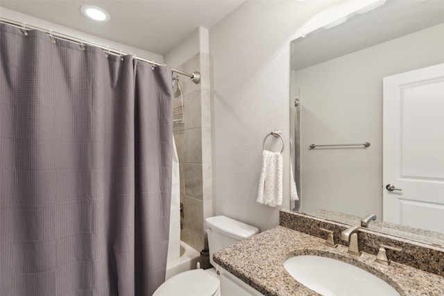 9521 Excursion Dr, Oak Point, TX 75068 - full bathroom featuring toilet, shower / bath combo with shower curtain, and vanity