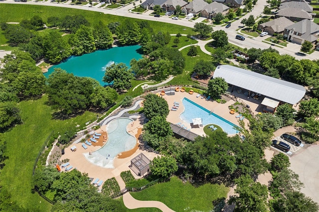 9521 Excursion Dr, Oak Point, TX 75068 - aerial view of property and surrounding area featuring a pool, nearby suburban area, and a large body of water
