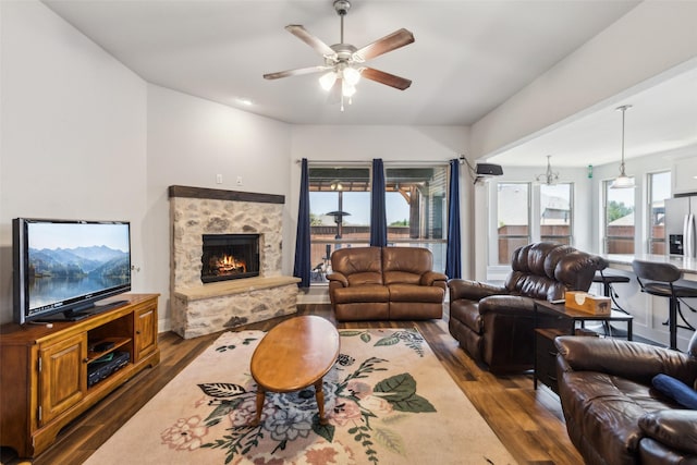 9521 Excursion Dr, Oak Point, TX 75068 - living area with wood finished floors, ceiling fan, and a fireplace