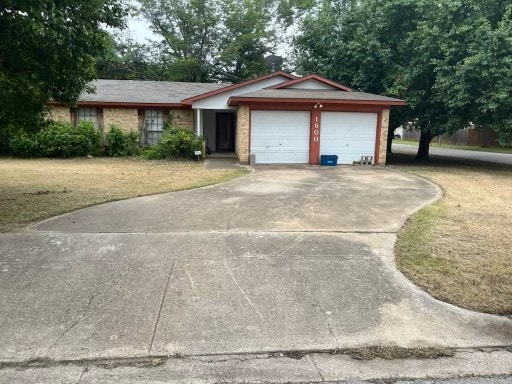 1600 Briar Run, Benbrook, TX 76126 - single story home featuring an attached garage and driveway