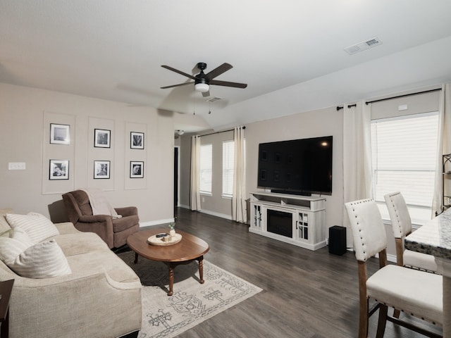 1402 Fantail Ln, Ennis, TX 75119 - living area with ceiling fan, dark wood-style floors, and baseboards