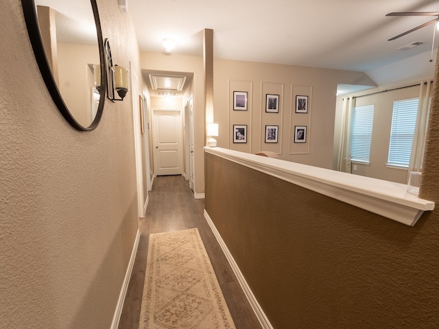 1402 Fantail Ln, Ennis, TX 75119 - corridor with wood finished floors, baseboards, and a textured wall